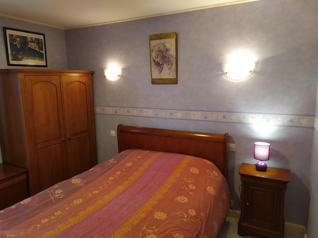 Posteľ alebo postele v izbe v ubytovaní Gîtes "La Sérénité Marivaloise"