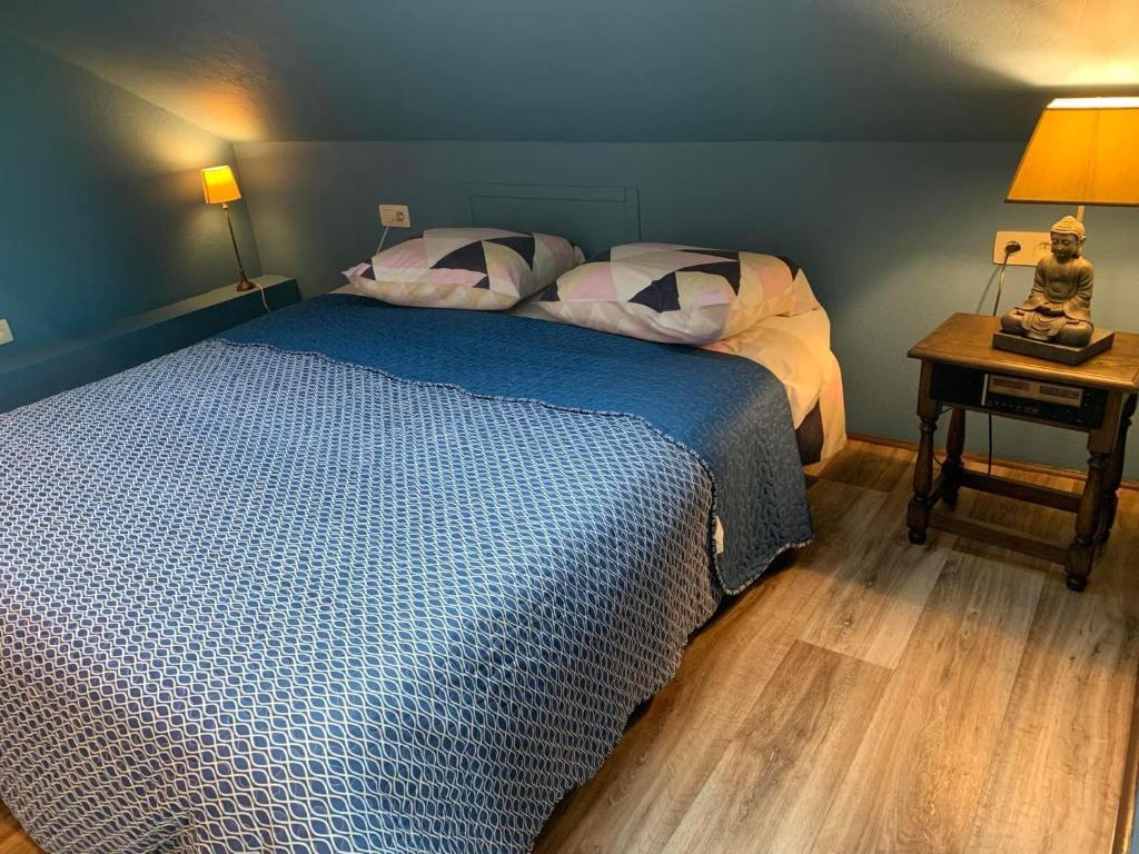 Postel nebo postele na pokoji v ubytování Domaine de falimont à Labuissière