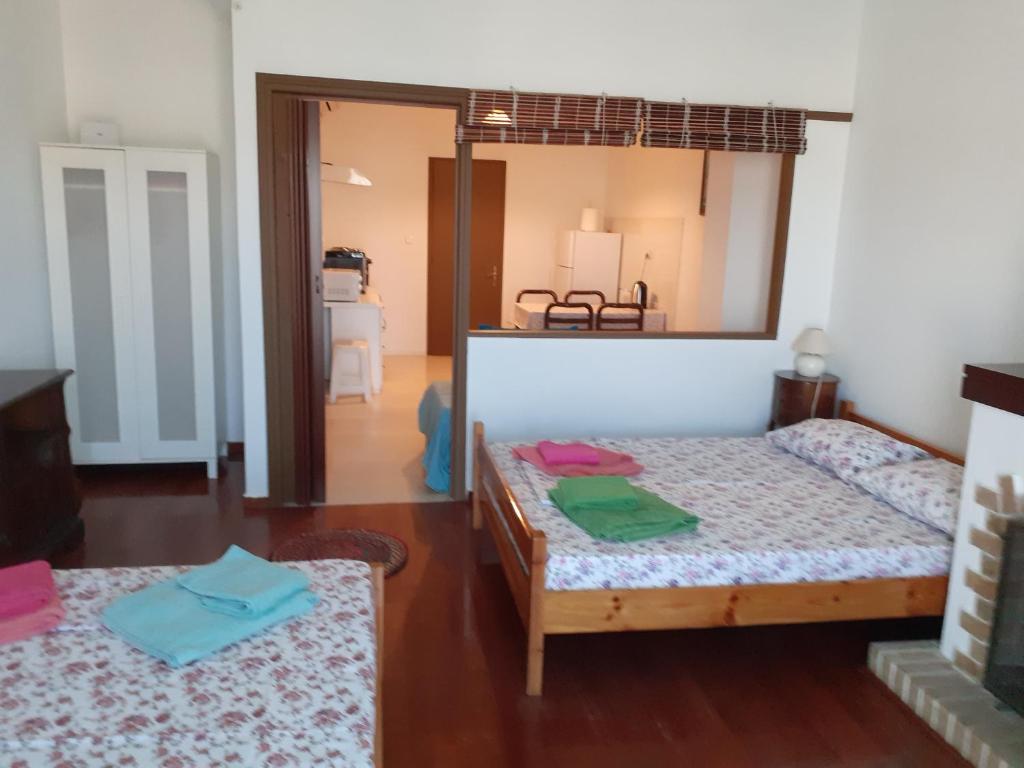 Postel nebo postele na pokoji v ubytování Alex Central City Accommodation