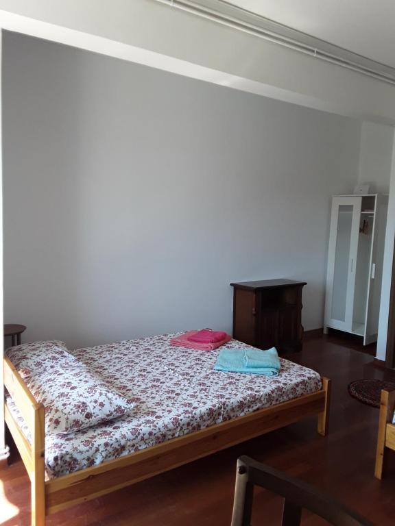 Postel nebo postele na pokoji v ubytování Alex Central City Accommodation