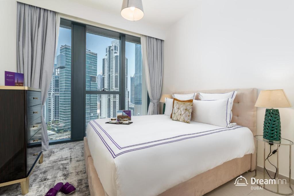 Postel nebo postele na pokoji v ubytování Dream Inn Apartments- Boulevard Heights