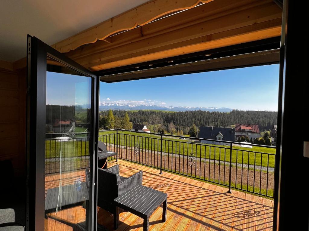 Balkón nebo terasa v ubytování Tatra Village