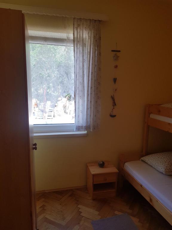Postel nebo postele na pokoji v ubytování Apartments Damić