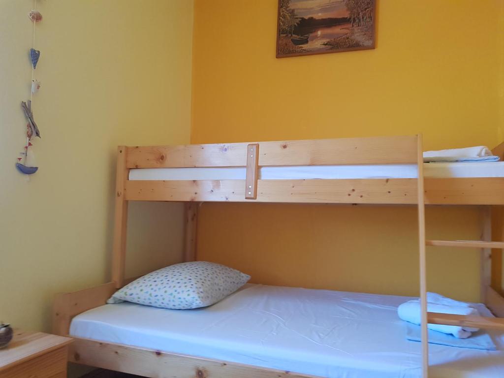Postel nebo postele na pokoji v ubytování Apartments Damić