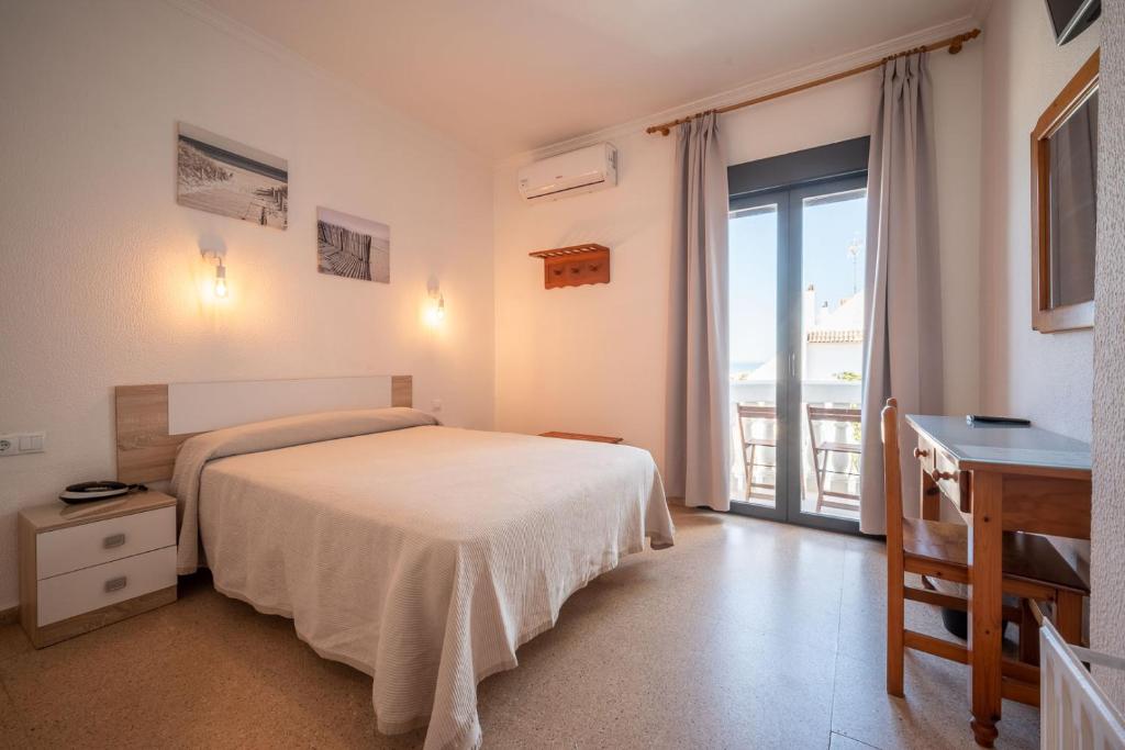 Postel nebo postele na pokoji v ubytování Solymar