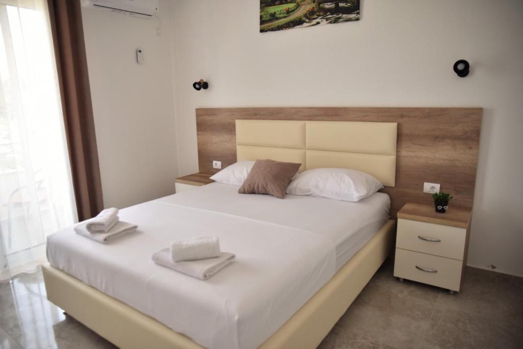 Voodi või voodid majutusasutuse Apartments kupi ul rudaj 41 toas
