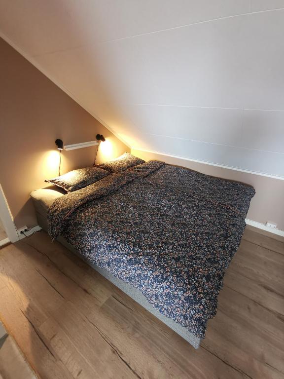Postel nebo postele na pokoji v ubytování Andenes Sentrum Apartment