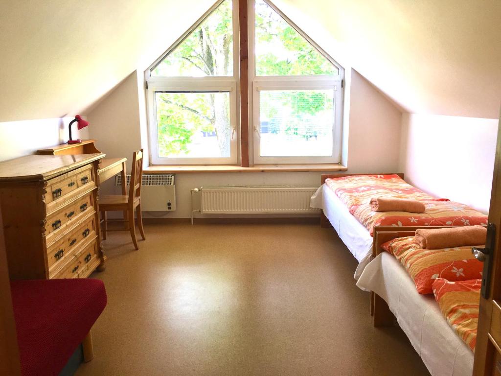 Postel nebo postele na pokoji v ubytování Na Zvonici