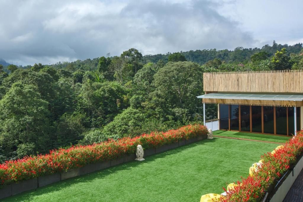 Jardin de l'établissement Giriwood Hotel & Villa