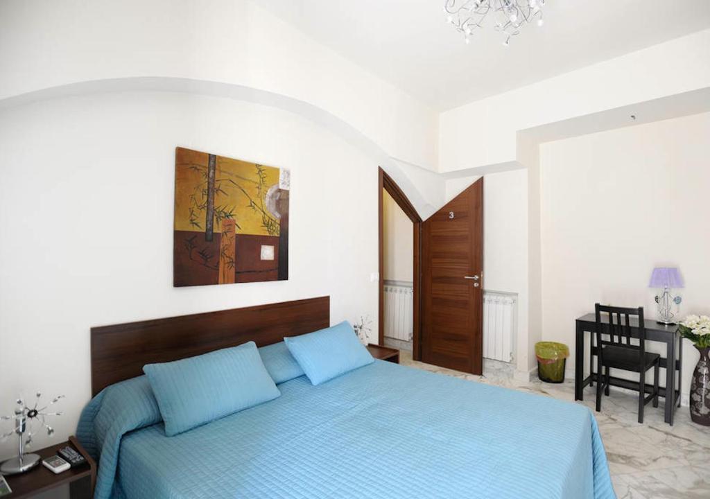 Posteľ alebo postele v izbe v ubytovaní B&B Le Vie D'Arte