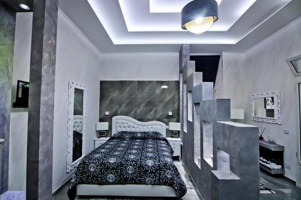 A bed or beds in a room at Cuore di Napoli