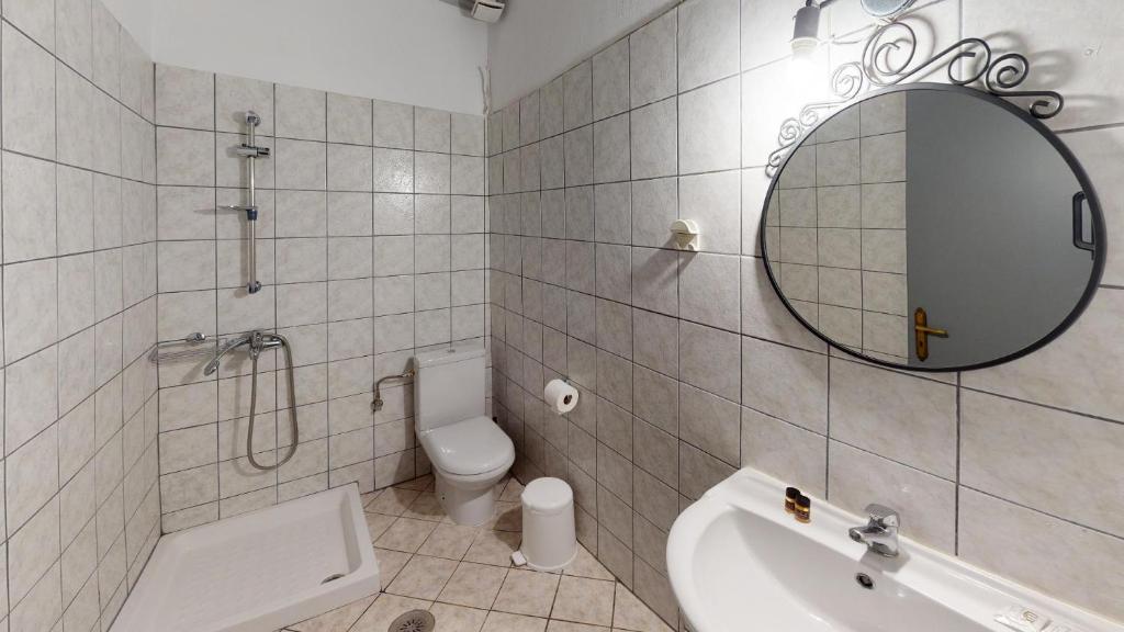 Koupelna v ubytování Hotel Akropolis