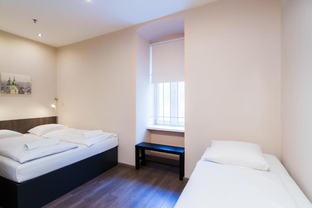 Postel nebo postele na pokoji v ubytování Minimino hotel