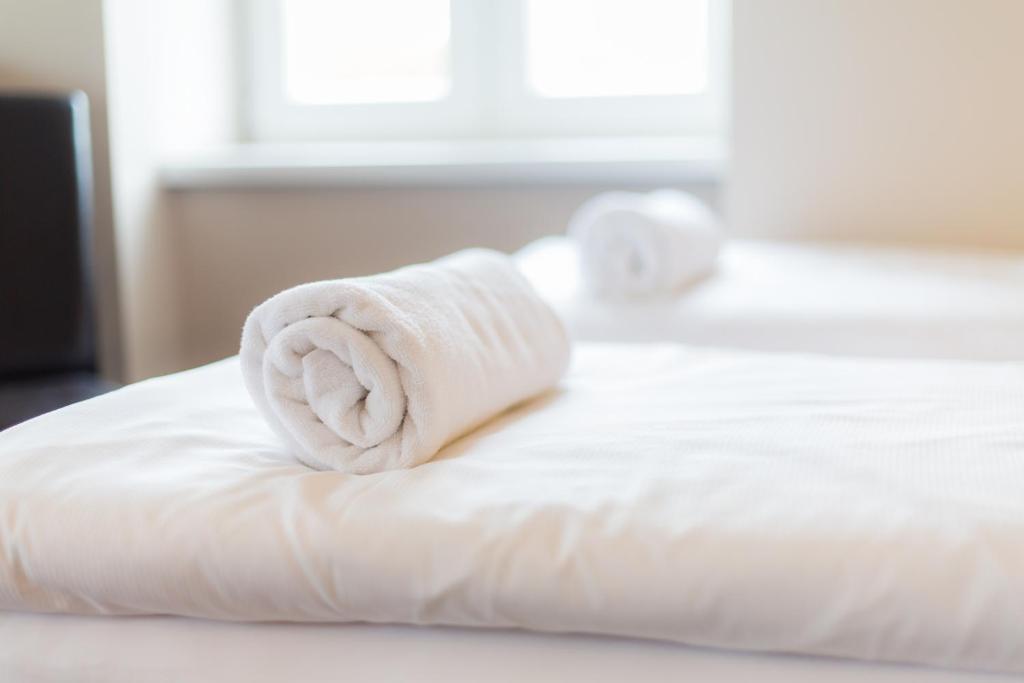 Postel nebo postele na pokoji v ubytování Minimino hotel
