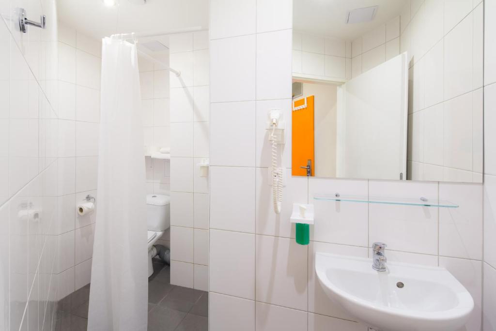 Koupelna v ubytování Minimino hotel