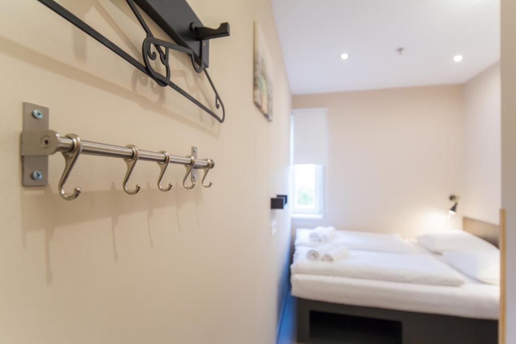 Postel nebo postele na pokoji v ubytování Minimino hotel