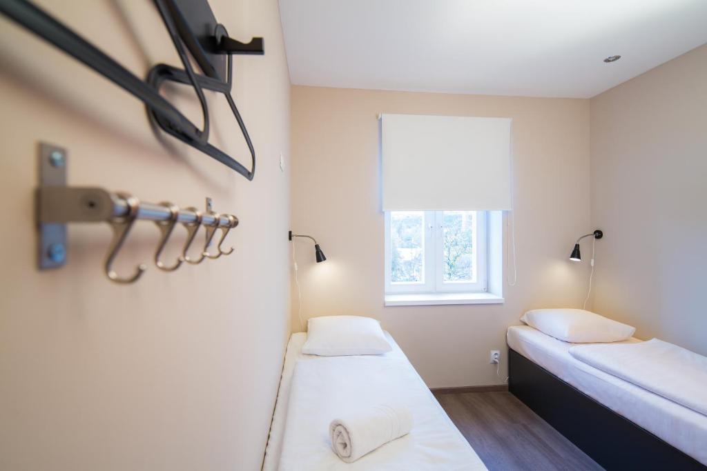 Postel nebo postele na pokoji v ubytování Minimino hotel