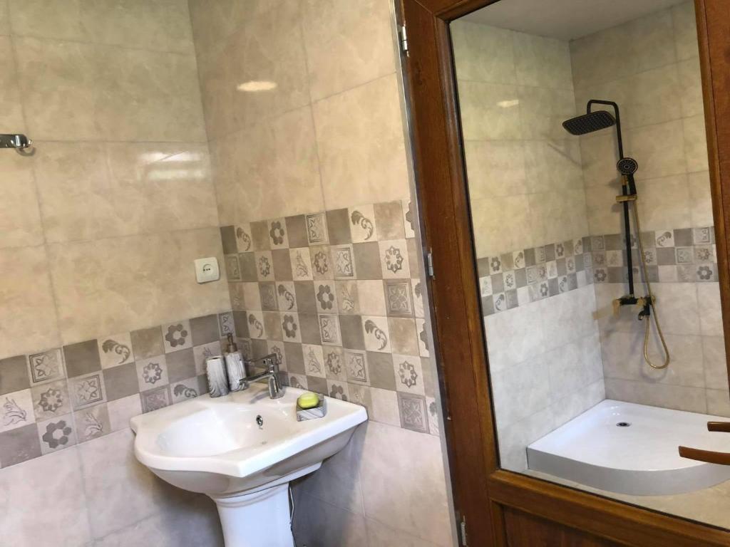 Koupelna v ubytování Melen-guest house