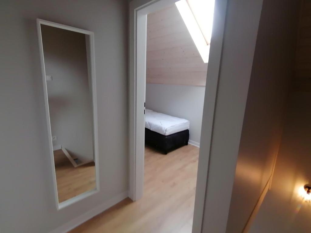 Posteľ alebo postele v izbe v ubytovaní M&M Apartamenty Wicie