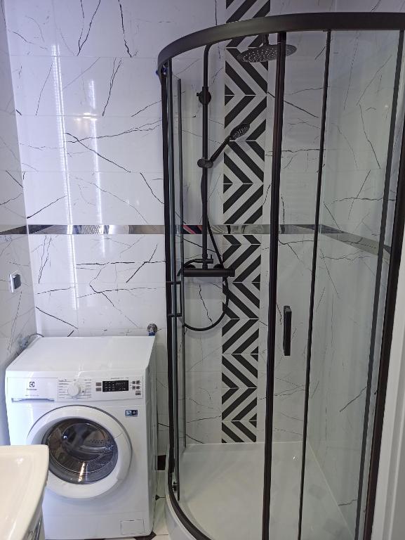 Kúpeľňa v ubytovaní Apartament Czarna Perła