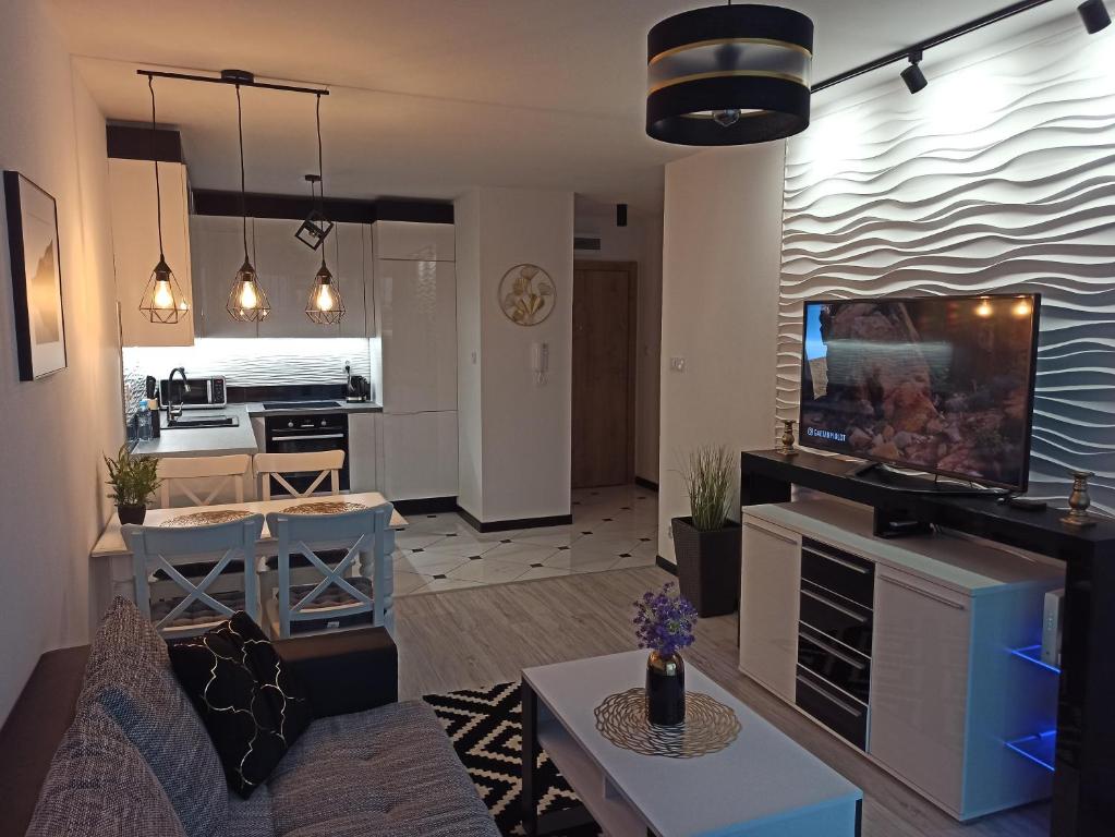 Kuchyňa alebo kuchynka v ubytovaní Apartament Czarna Perła