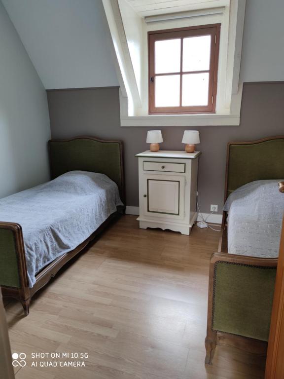 Postel nebo postele na pokoji v ubytování Chambre de pouligny