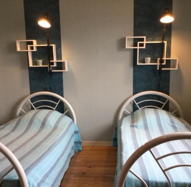 Postel nebo postele na pokoji v ubytování Chambre de pouligny