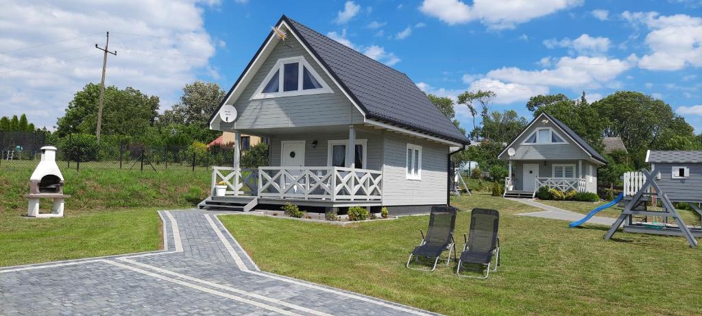 Vonkajšia záhrada v ubytovaní Szary domek nad jeziorem 2