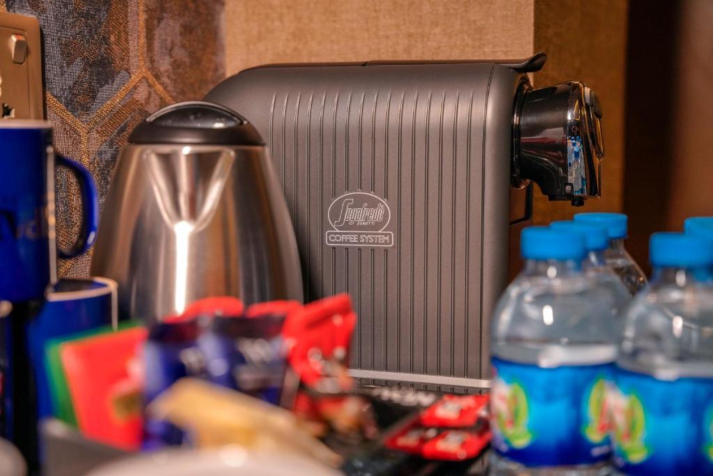 Příslušenství pro přípravu čaje a kávy v ubytování Sipan Hotel