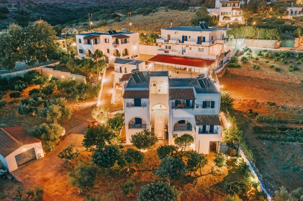 an aerial view of a large white house at Theofilos Appartements in Livadi
