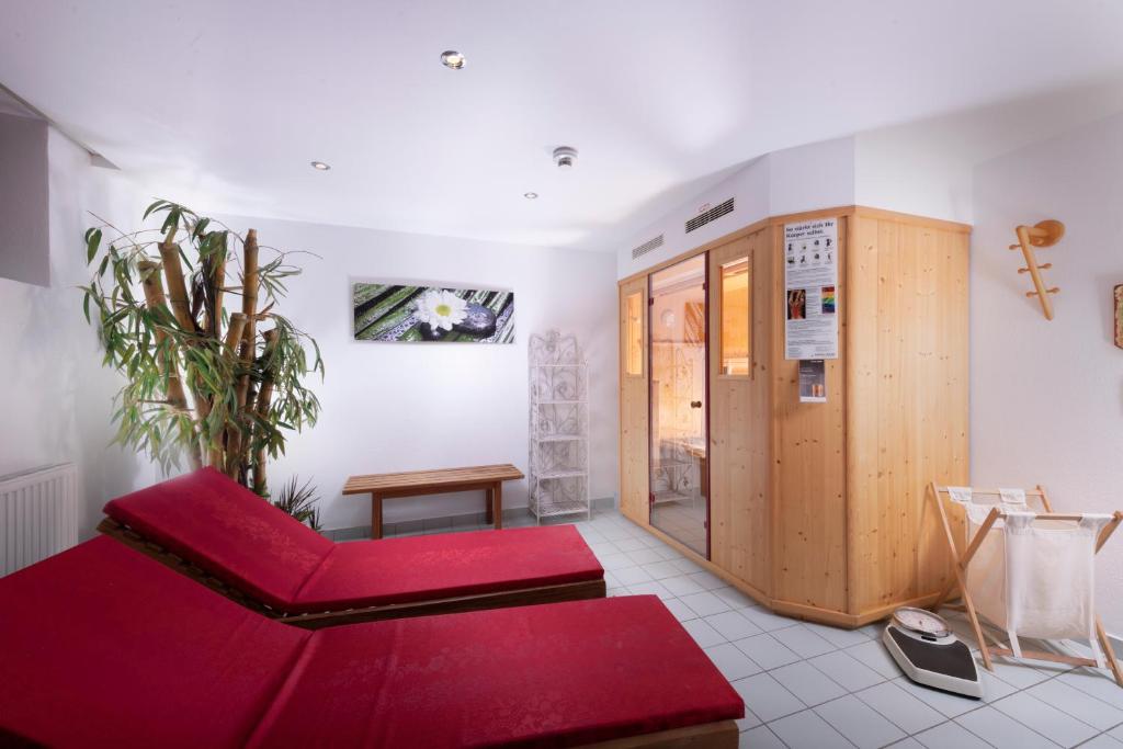 Postel nebo postele na pokoji v ubytování Familienhotel Central