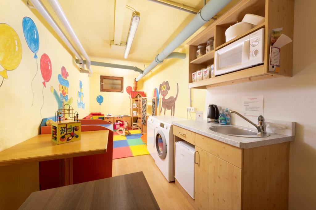 Kuchyň nebo kuchyňský kout v ubytování Familienhotel Central