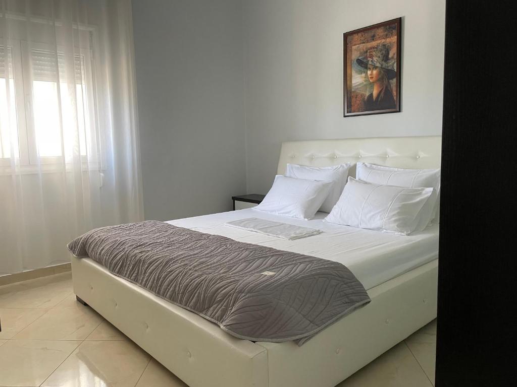 A bed or beds in a room at Apartment Vlorida