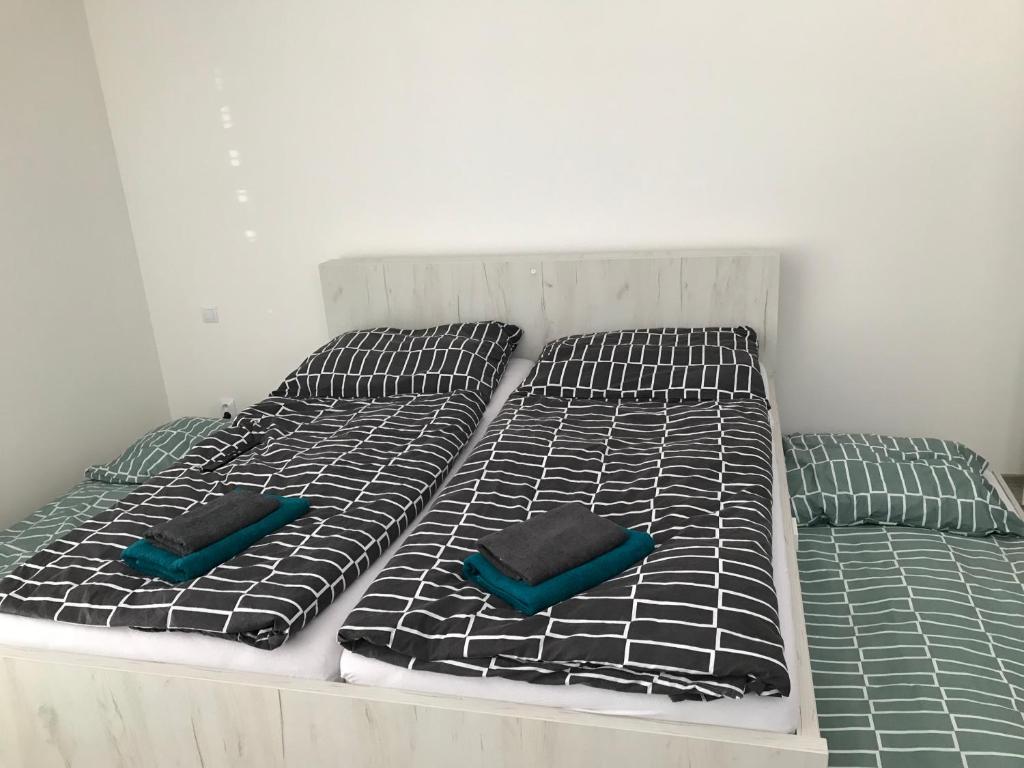 Postel nebo postele na pokoji v ubytování Apartmán Lipno
