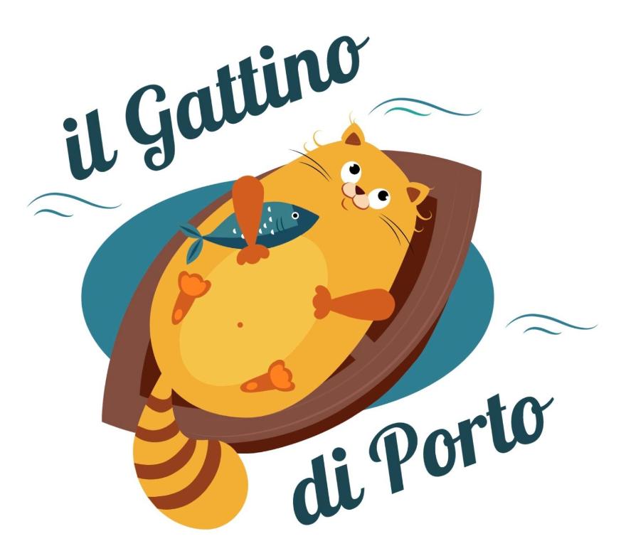a cat is lying on a hammock in the ocean at Il Gattino di Porto - apt 5 - Bilocale terrazzo piscina in Imperia