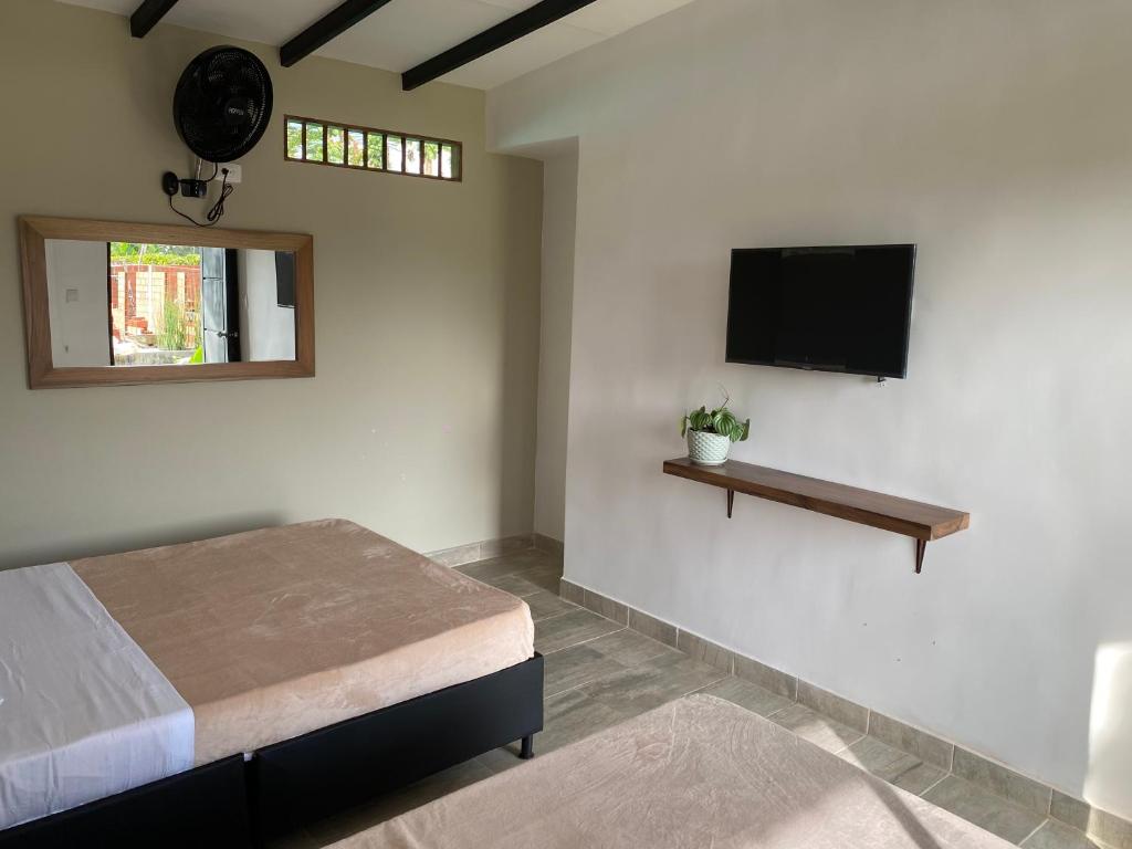 Una cama o camas en una habitación de Baum Hotel