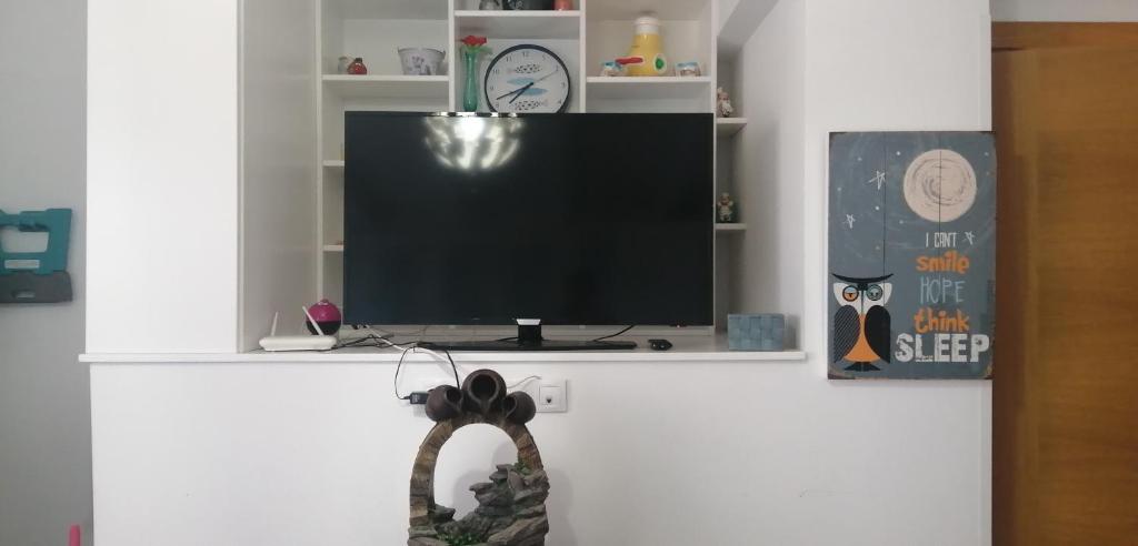 TV a/nebo společenská místnost v ubytování casapueblo