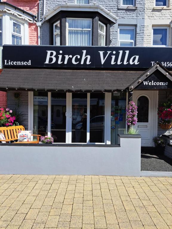 a building with a sign for a british villa at Birch Villa in Blackpool