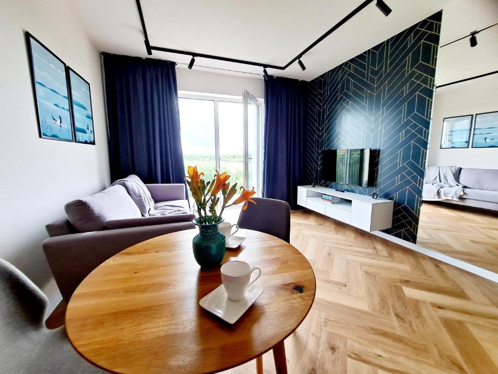 Posedenie v ubytovaní Apartament Północne Mazury