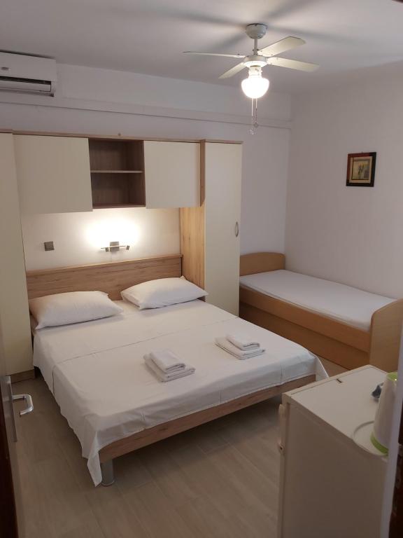 Postel nebo postele na pokoji v ubytování B&B Sobe Magdalena