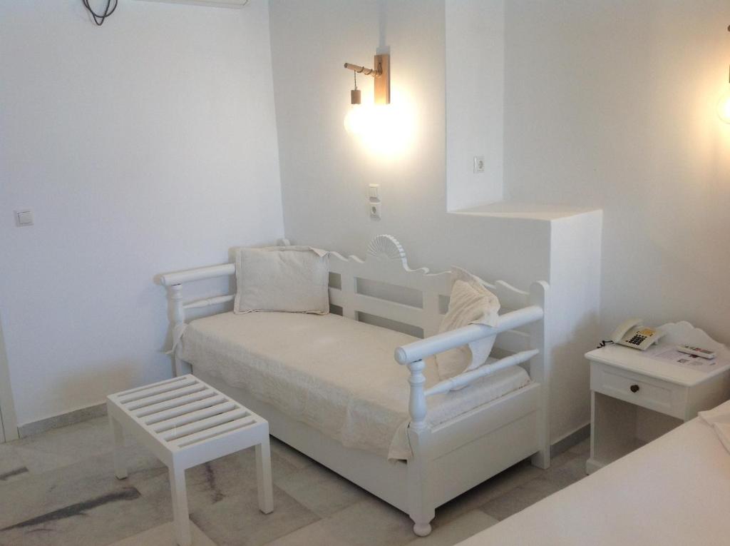 Postel nebo postele na pokoji v ubytování Hotel Anixis
