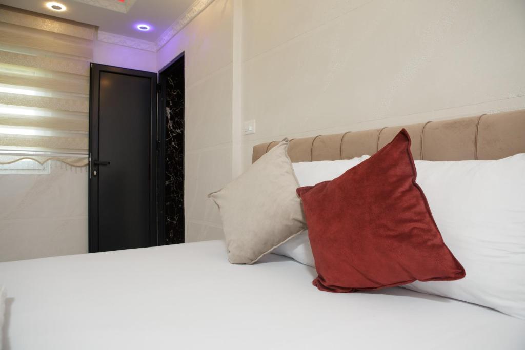 Postel nebo postele na pokoji v ubytování B H B Apartmani