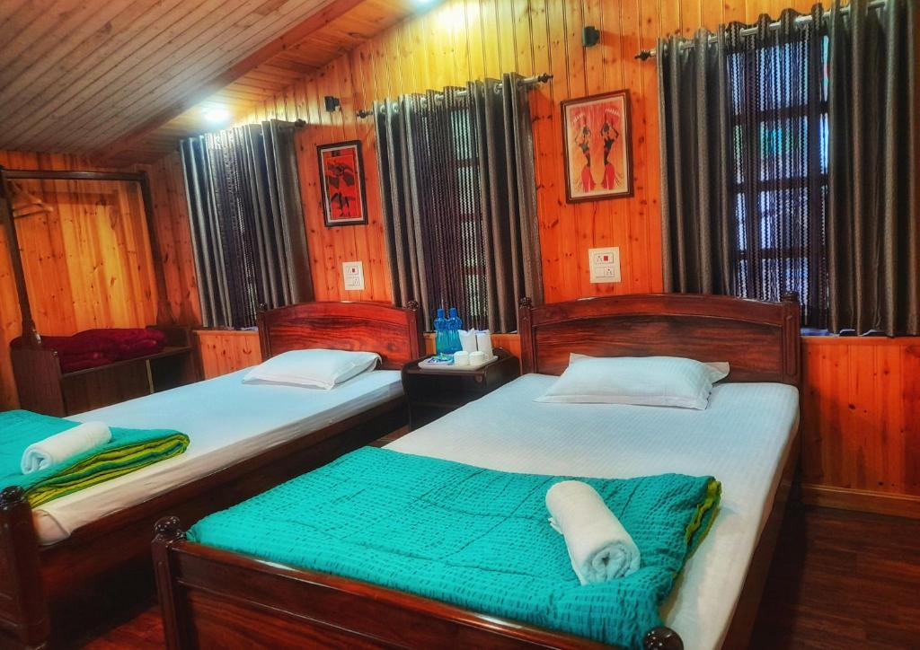 Postel nebo postele na pokoji v ubytování Dreamhome Stay