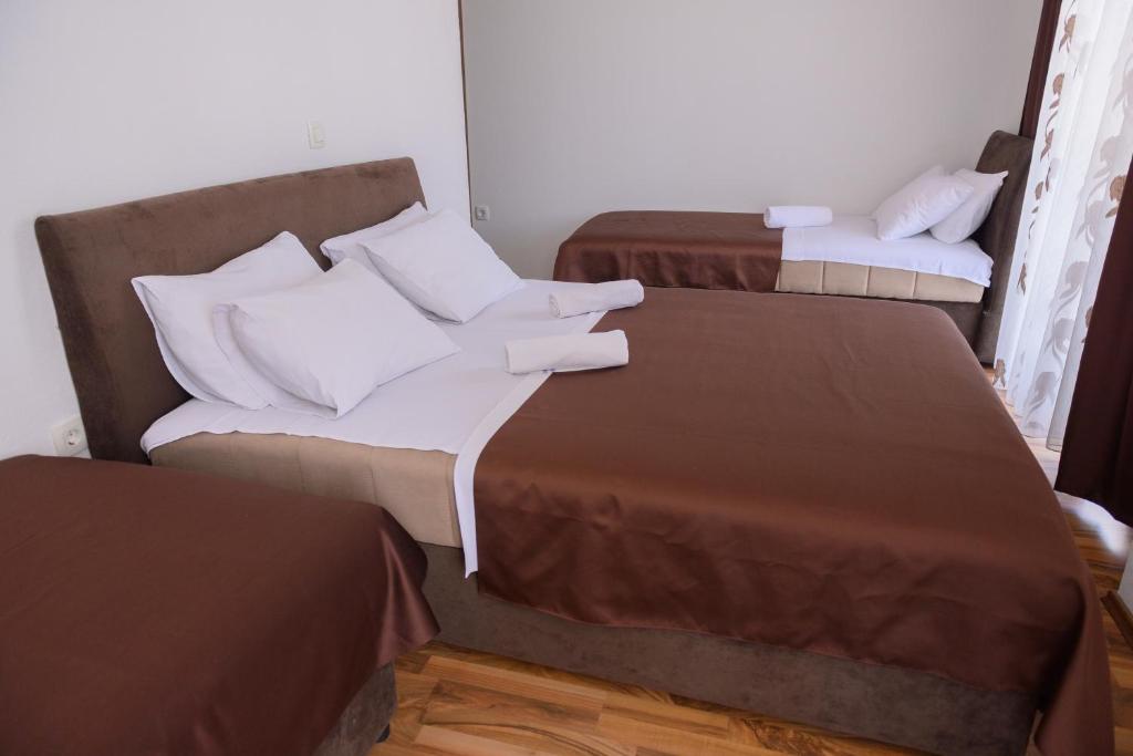 Postel nebo postele na pokoji v ubytování MS Hotel