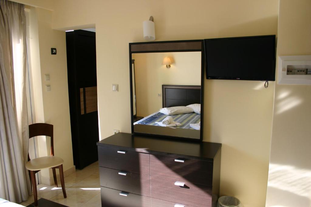Postel nebo postele na pokoji v ubytování Petit Palais Hotel