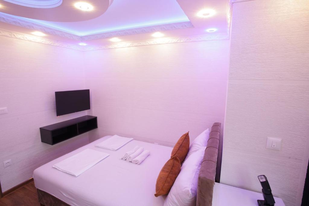 Postel nebo postele na pokoji v ubytování B H B Apartmani