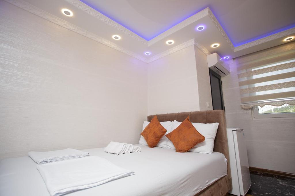 Postel nebo postele na pokoji v ubytování B H B Apartmani