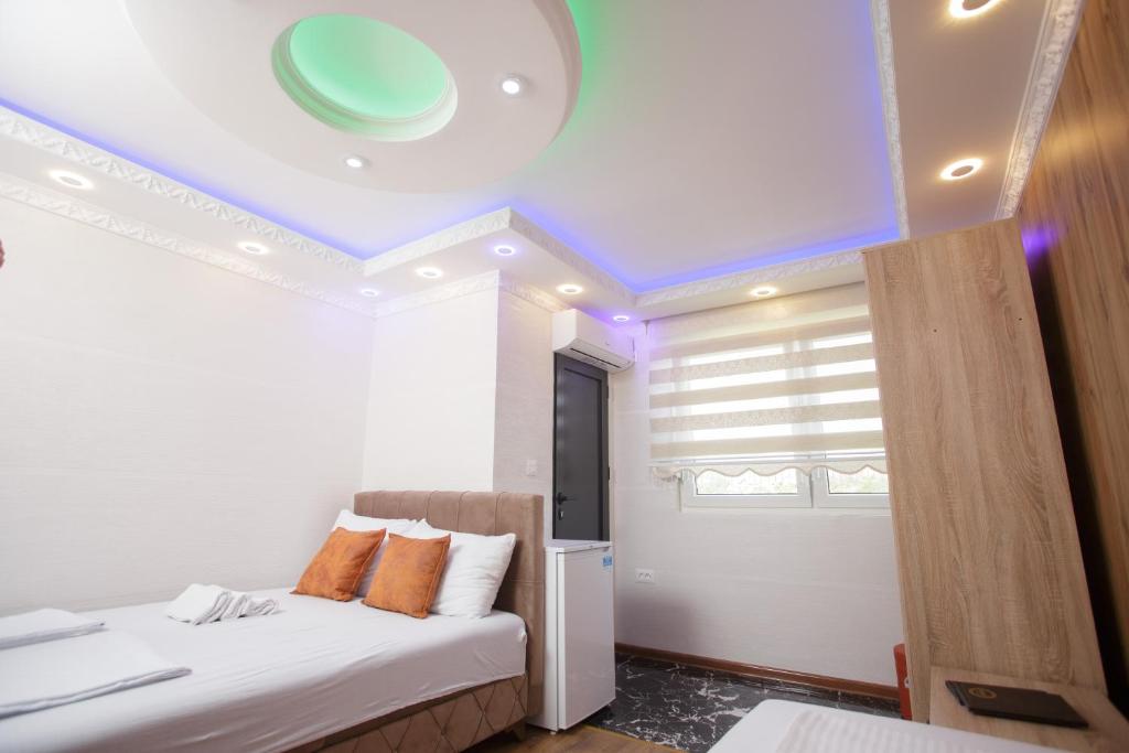 Postel nebo postele na pokoji v ubytování B H B Apartmani