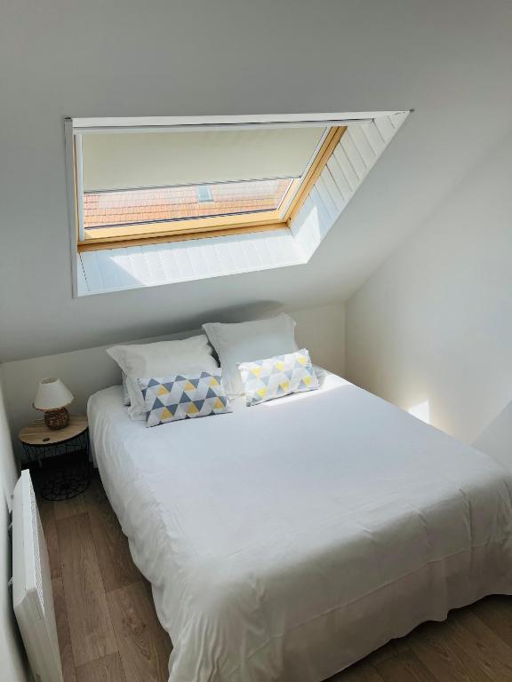 Posteľ alebo postele v izbe v ubytovaní Appartement Entre ville et nature