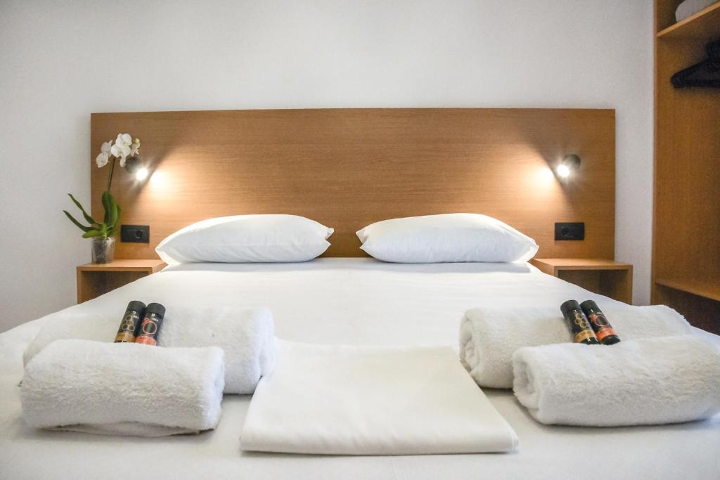 Postel nebo postele na pokoji v ubytování SMAROULA